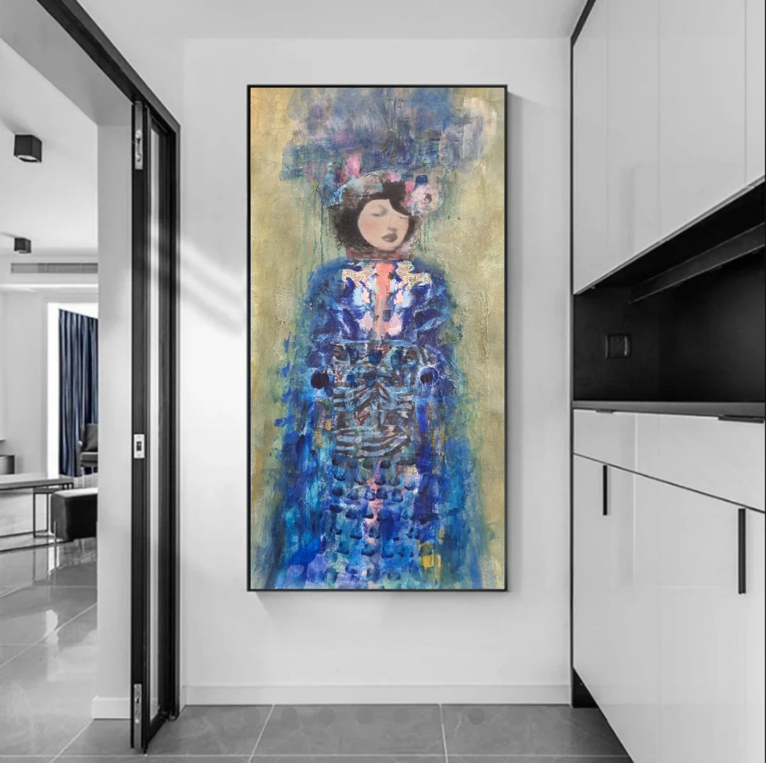 Colorful abstract painting of a woman in a blue dress on a white wall.