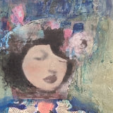 Abstract artwork with a stylized face and colorful background