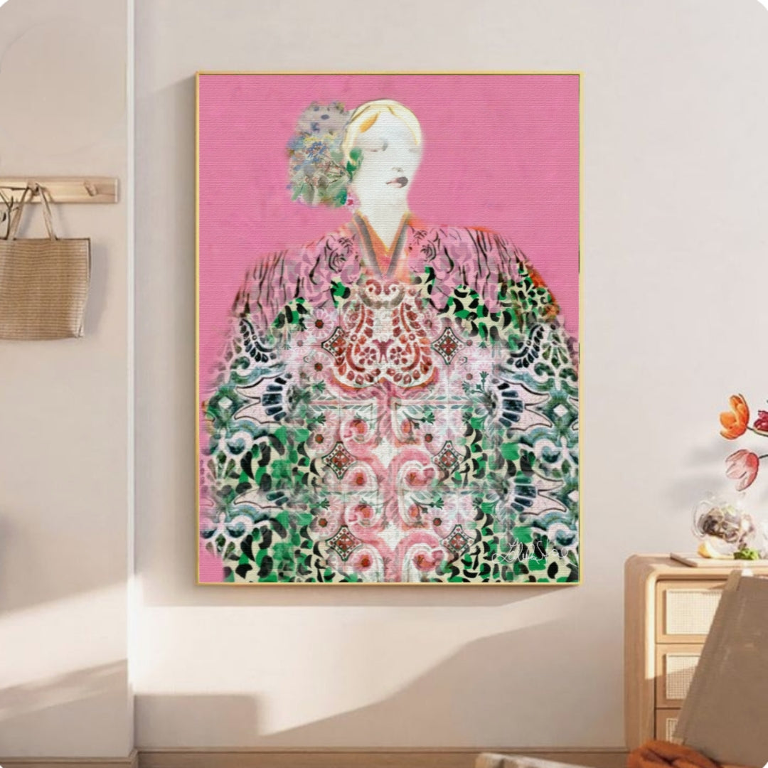 Framed artwork of a person in traditional attire on a pink background, displayed in a room.